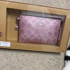 Coach Metallic Pink Wristlet with Heart Charm